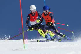 Neil Simpson and brother Andrew en route to winning bronze in the Para Alpine Skiing Men's Super Combined Slalom Vision Impaired at Yanqing National Alpine Skiing Centre during day three of the Beijing 2022 Winter Paralympics. (Photo by Alexander Hassenstein/Getty Images)