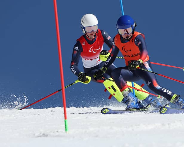 Neil Simpson and brother Andrew en route to winning bronze in the Para Alpine Skiing Men's Super Combined Slalom Vision Impaired at Yanqing National Alpine Skiing Centre during day three of the Beijing 2022 Winter Paralympics. (Photo by Alexander Hassenstein/Getty Images)