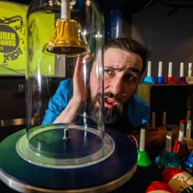 Lewis Fitzsimmons of Dundee Science Centre tunes into the bell jar