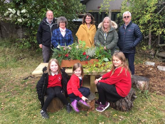 The flower planter adorned the finish line podium at Glenshee