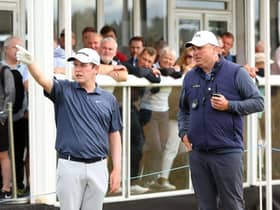 Bob MacIntyre gets a ruling during the second round of the Genesis Scottish Open at The Renaissance Club in East Lothian. Picture: Andrew Redington/Getty Images.