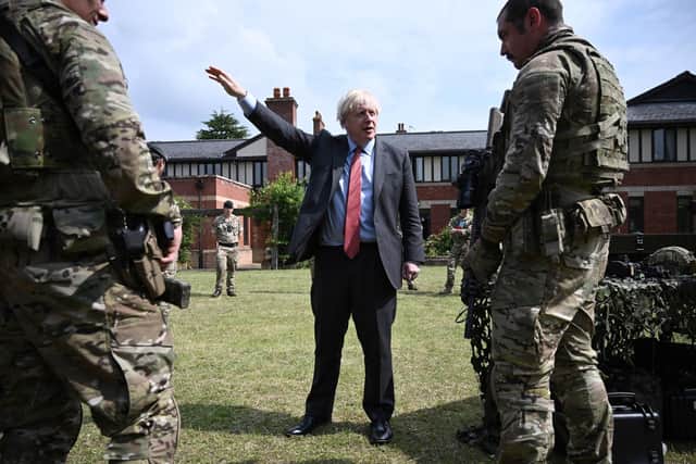 Prime Minister Boris Johnson meets soldiers of the new Ranger Regiment during a visit to Aldershot Garrison in Hampshire. Picture: Daniel Leal-Olivas/PA Wire