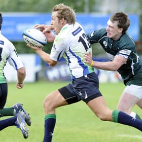 Hawick's Stuart Hogg tackles Malcolm Clapperton during a match against Boroughmuir at Meggetland in 2010. Pic Ian Rutherford