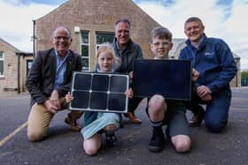 Jim Fairlie MSP, Simon Oldham Highland Spring Group managing director, Stuart Batty SSE senior project development manager, and pupils from Blackford Primary School. Picture by Nick Mailer Photography