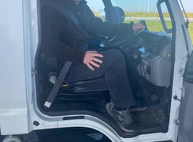 David Cameron is driving a small lorry of supplies to Poland