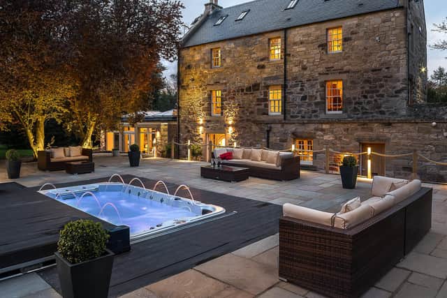 The property sleeps ten, with five bedrooms and bathrooms, a Hydropool swim spa and an orangery extension. Picture: Viktor Vass.