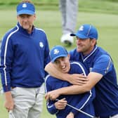 Matt Fitzpatrick gets a playful hug from Bernd Wiesberger as Ian Poulter looks on during a practice round prior to the 43rd Ryder Cup at Whistling Straits in Kohler, Wisconsin. Picture: Richard Heathcote/Getty Images.