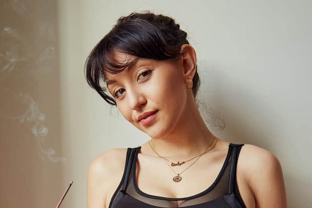 Meditation guide, Reiki Master, and tarot reader Jade Mordente.