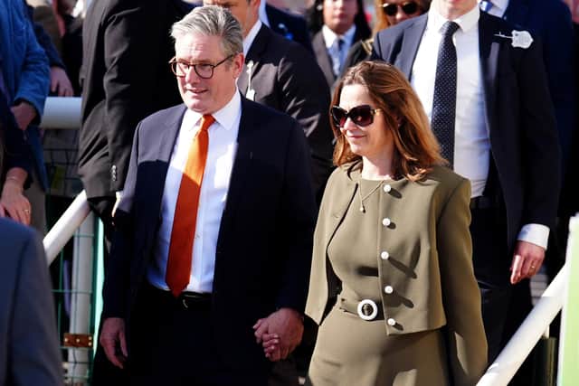 Prime Minister Sir Keir Starmer with his wife Victoria, who is also said to have received free gifts