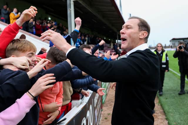 Inverness manager Duncan Ferguson celebrates with the travelling fans after the 3-2 victory in Arbroath. (Photo by Ross Brownlee / SNS Group)