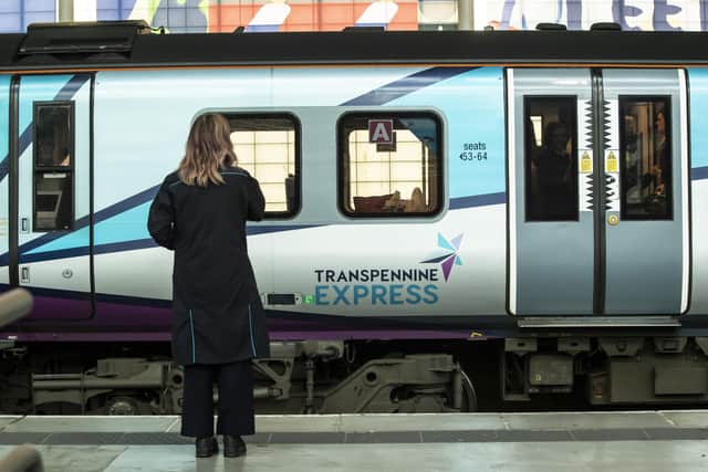 A passenger waiting for a TransPennine Express train. The operator has issued “do not travel” advice, asking customers to delay their journeys in and out of Edinburgh until after 3pm, as parts of the UK brace for high winds. Picture: Danny Lawson/PA Wire