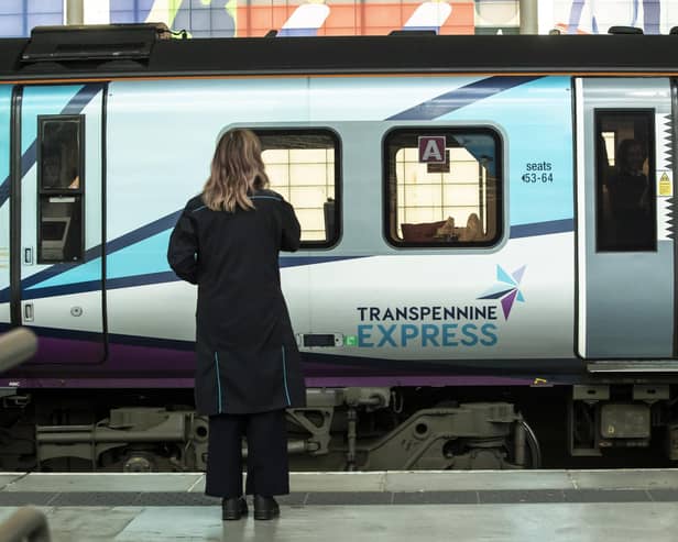A passenger waiting for a TransPennine Express train. The operator has issued “do not travel” advice, asking customers to delay their journeys in and out of Edinburgh until after 3pm, as parts of the UK brace for high winds. Picture: Danny Lawson/PA Wire