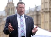 A minister has come under fire for suggesting there could be “some little man in China” eavesdropping on his own private conversations