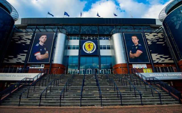 Captains Andy Robertson and Rachel Corsie adorn the exterior of Hampden. (Photo by Ross MacDonald / SNS Group)