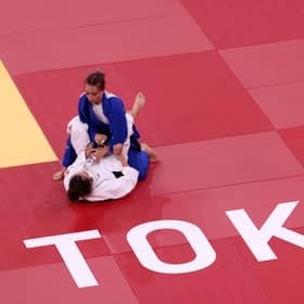 Britain's Chelsie Giles takes on Charlie van Snick oduring the women's Olympic 52kg judo repechage at Nippon Budokan in Tokyo, Japan. Picture: Leon Neal/Getty Images