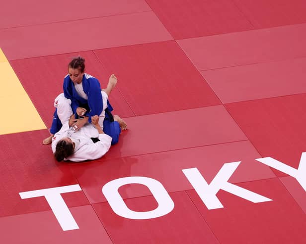 Britain's Chelsie Giles takes on Charlie van Snick oduring the women's Olympic 52kg judo repechage at Nippon Budokan in Tokyo, Japan. Picture: Leon Neal/Getty Images