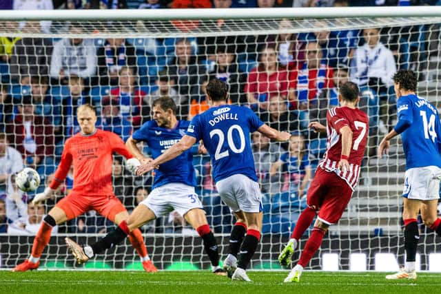 Olympiakos' Konstantinos Fortounis opens the scoring as the Greek club prevailed at Ibrox against Rangers.