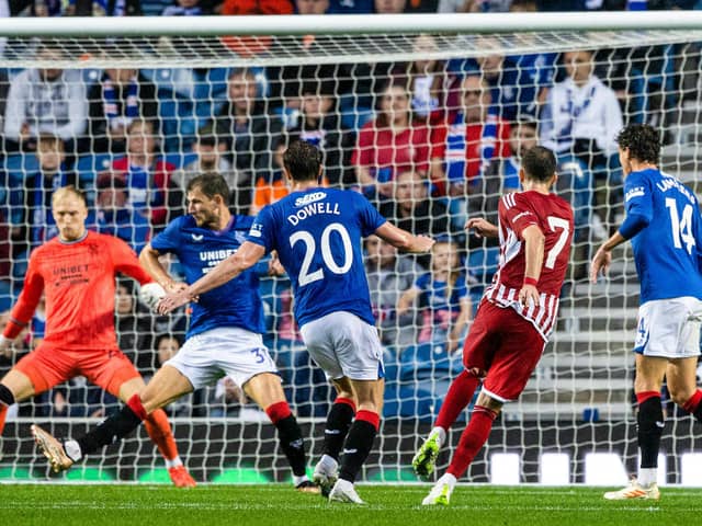 Olympiakos' Konstantinos Fortounis opens the scoring as the Greek club prevailed at Ibrox against Rangers.