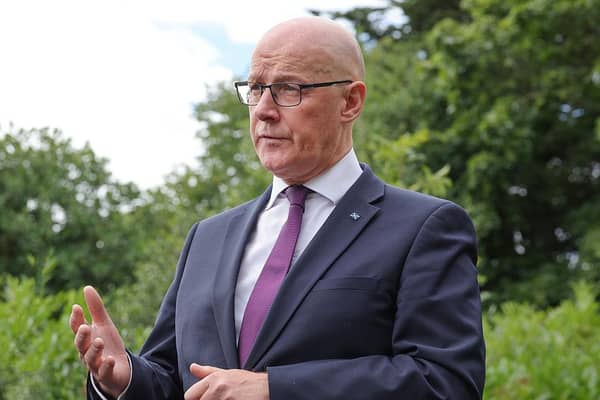 First Minister John Swinney wants Prime Minister Andy Burnham to reconsider the UK government’s block on plans by a Chinese firm to build a wind turbine factory in Scotland (Picture: Steve Welsh - Pool/Getty Images)