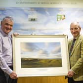 Paul Lawrie receives a framed print of the Championship Course from general manager Neil Hampton to mark being made an honorary member of Royal Dornoch. Picture: Picture: Matthew Harris