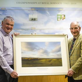 Paul Lawrie receives a framed print of the Championship Course from general manager Neil Hampton to mark being made an honorary member of Royal Dornoch. Picture: Picture: Matthew Harris