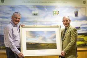 Paul Lawrie receives a framed print of the Championship Course from general manager Neil Hampton to mark being made an honorary member of Royal Dornoch. Picture: Picture: Matthew Harris