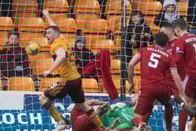 Connor Shields turns away to celebrate after making it 2-1 to Motherwell against Aberdeen at Fir Park.  (Photo by Craig Foy / SNS Group)