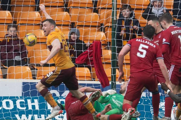 Connor Shields turns away to celebrate after making it 2-1 to Motherwell against Aberdeen at Fir Park.  (Photo by Craig Foy / SNS Group)