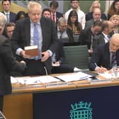 Boris Johnson takes the oath ahead of his evidence to the Commons' Privileges Committee (Picture: House of Commons/UK Parliament)