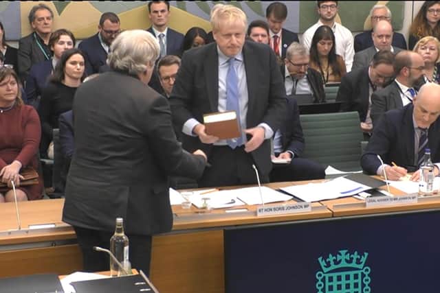 Boris Johnson takes the oath ahead of his evidence to the Commons' Privileges Committee (Picture: House of Commons/UK Parliament)