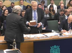 Boris Johnson takes the oath ahead of his evidence to the Commons' Privileges Committee (Picture: House of Commons/UK Parliament)