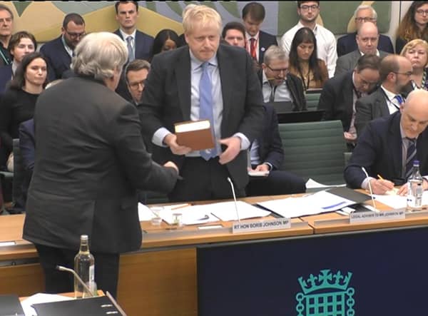 Boris Johnson takes the oath ahead of his evidence to the Commons' Privileges Committee (Picture: House of Commons/UK Parliament)