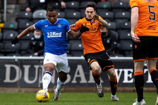 Alfredo Morelos challenges Dundee United's Liam Smith during Rangers' 2-1 win at Tannadice.