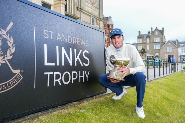 Coxmoor's Seb Cave shows off the trophy after winning the Links Trophy in St Andrews. Picture: Links Trust