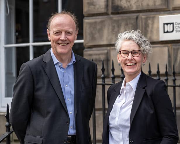 Andrew Chalmers and his managing partner successor Laura Irvine. Picture: Paul Bock.