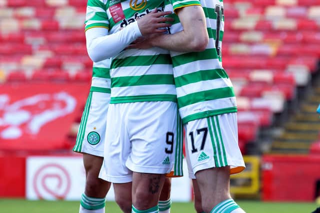 Leigh Grififths celebrates with Ryan Christie celebrates after scoring to make it 3-2 in the 3-3 draw a week ago with an Aberdeen the Scottish Cup holders will now face in the semi-final of the competition (Photo by Alan Harvey / SNS Group)