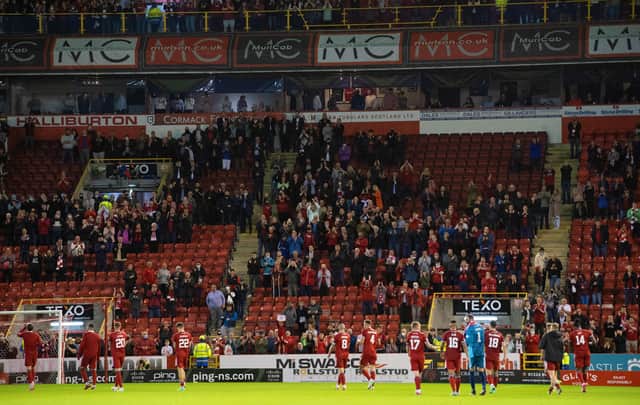 Aberdeen players thank their supporters at the conclusion of last Thursday's victory over Breidablik. Picture: SNS