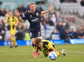 Kye Francis Rowles of the Mariners brings down Benjamin Old of Phoenix in the penalty area during the A-League match between Wellington Phoenix and Central Coast Mariners at WIN Stadium, on November 27, 2021, in Wollongong, Australia. (Photo by Mark Evans/Getty Images)
