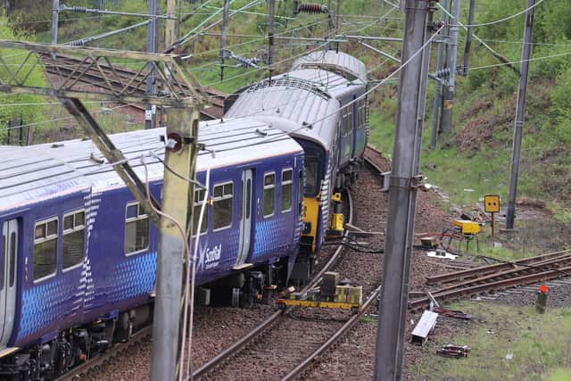 Wheels of five of the six carriages came off the tracks in the derailment. Picture: Donald Stirling