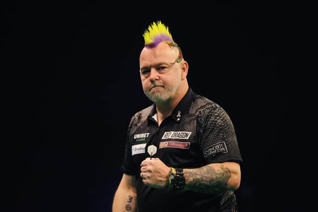 Peter Wright threw the winning double for Scotland. (Photo by Alex Burstow/Getty Images)