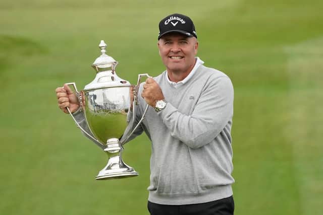 Thomas Levet shows off the trophy after winning this year's Scottish Senior Open hosted by Paul Lawrie at Royal Aberdeen. Picture: Getty Images