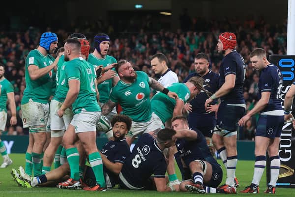 Ireland overcame Scotland 17-13 in Dublin to secure the Six Nations title.