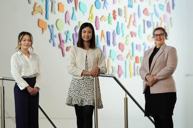 Joey Mak, Nam Gowans-Brown, and Julie Oliveira of the EICC. Picture: Stewart Attwood