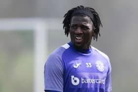 Rocky Bushiri has penned a three-year deal with Hibs after making his loan permanent from Norwich City.