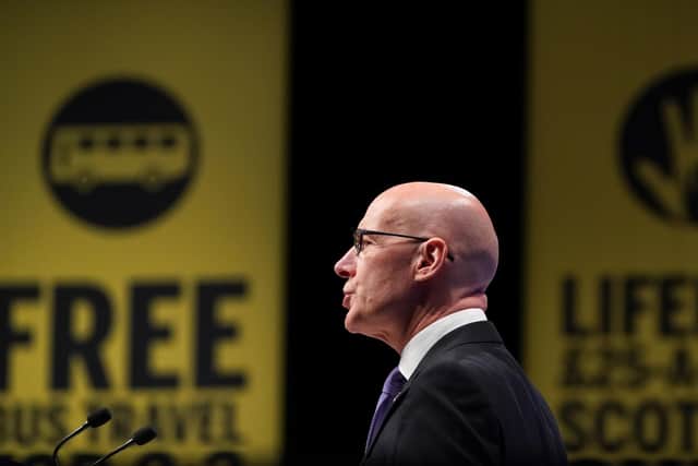 John Swinney during his speech at the SNP conference