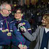 Jim and Jayne Cumming and presenter Beth Wallace.