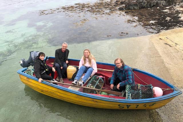 Actor Louis McCartney, producer Chris Young, actor Ella Lily Hyland and writer-director Johnny Barrington on the Isle of Lewis to film Silent Roar