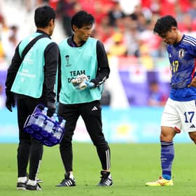 Celtic's Reo Hatate leaves the field with Japan medical staff during the Asian Cup round of 16 match between against Bahrain at Al Thumama Stadium in Qatar. (Photo by Robert Cianflone/Getty Images)