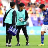 Celtic's Reo Hatate leaves the field with Japan medical staff during the Asian Cup round of 16 match between against Bahrain at Al Thumama Stadium in Qatar. (Photo by Robert Cianflone/Getty Images)
