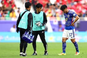 Celtic's Reo Hatate leaves the field with Japan medical staff during the Asian Cup round of 16 match between against Bahrain at Al Thumama Stadium in Qatar. (Photo by Robert Cianflone/Getty Images)